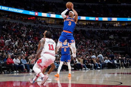 New York Knicks guard Josh Hart (3) shoots over Chicago Bulls forward DeMar DeRozan (11) during the second half at United Center