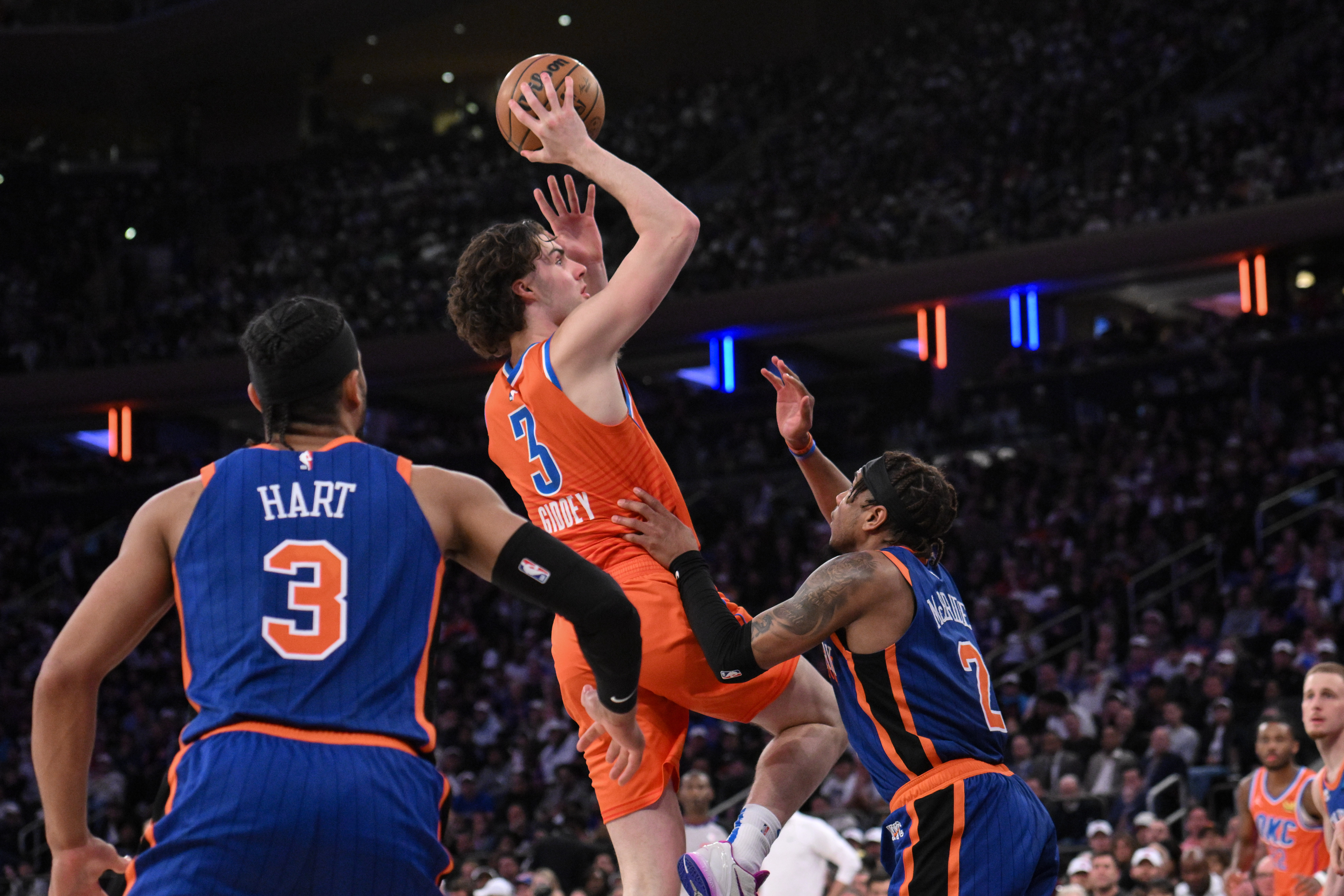 Oklahoma City Thunder guard Josh Giddey (3) shoots the ball against New York Knicks guard Miles McBride (2) during the fourth quarter at Madison Square Garden