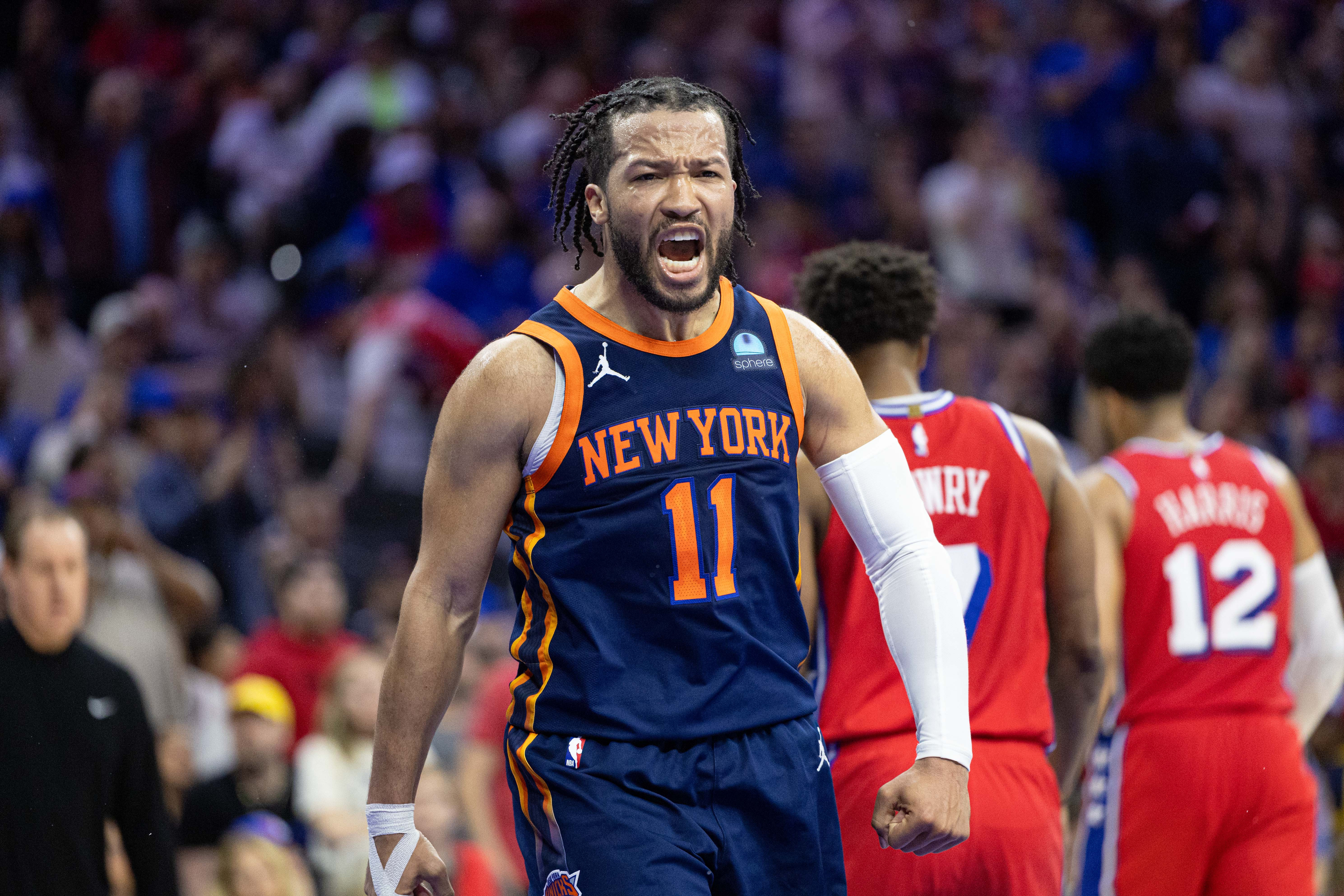 Apr 28, 2024; Philadelphia, Pennsylvania, USA; New York Knicks guard Jalen Brunson (11) reacts after scoring against the Philadelphia 76ers during the fourth quarter of game four of the first round in the 2024 NBA playoffs at Wells Fargo Center. Mandatory Credit: Bill Streicher-USA TODAY Sports