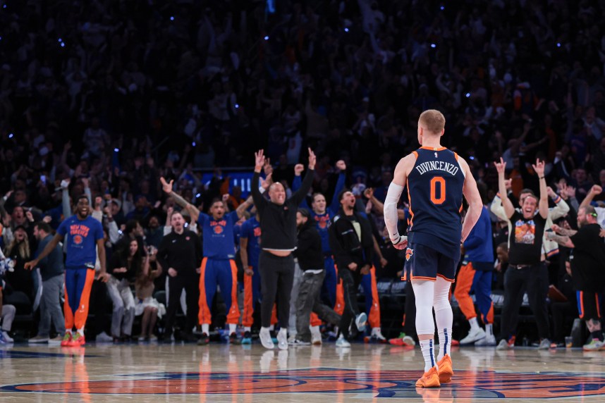 New York Knicks guard Donte DiVincenzo (0) reacts after making a three point basket during the fourth quarter during game two of the first round for the 2024 NBA playoffs against the Philadelphia 76ers at Madison Square Garden