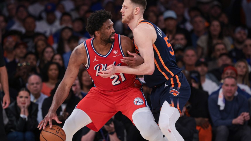 Philadelphia 76ers center Joel Embiid (21) is defended by New York Knicks center Isaiah Hartenstein (55) during the second half during game two of the first round for the 2024 NBA playoffs at Madison Square Garden