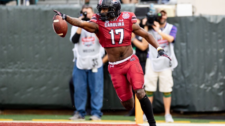South Carolina Gamecocks wide receiver Xavier Legette (17)(New York Giants prospect) celebrates after scoring a touchdown during the first half against the Notre Dame Fighting Irish in the 2022 Gator Bowl at TIAA Bank Field