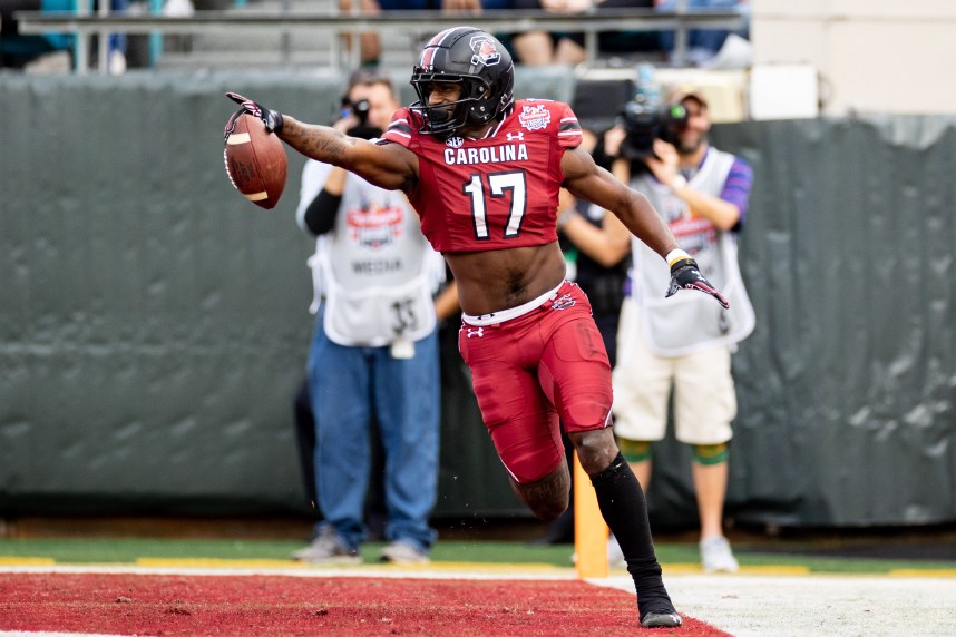 South Carolina Gamecocks wide receiver Xavier Legette (17)(New York Giants prospect) celebrates after scoring a touchdown during the first half against the Notre Dame Fighting Irish in the 2022 Gator Bowl at TIAA Bank Field