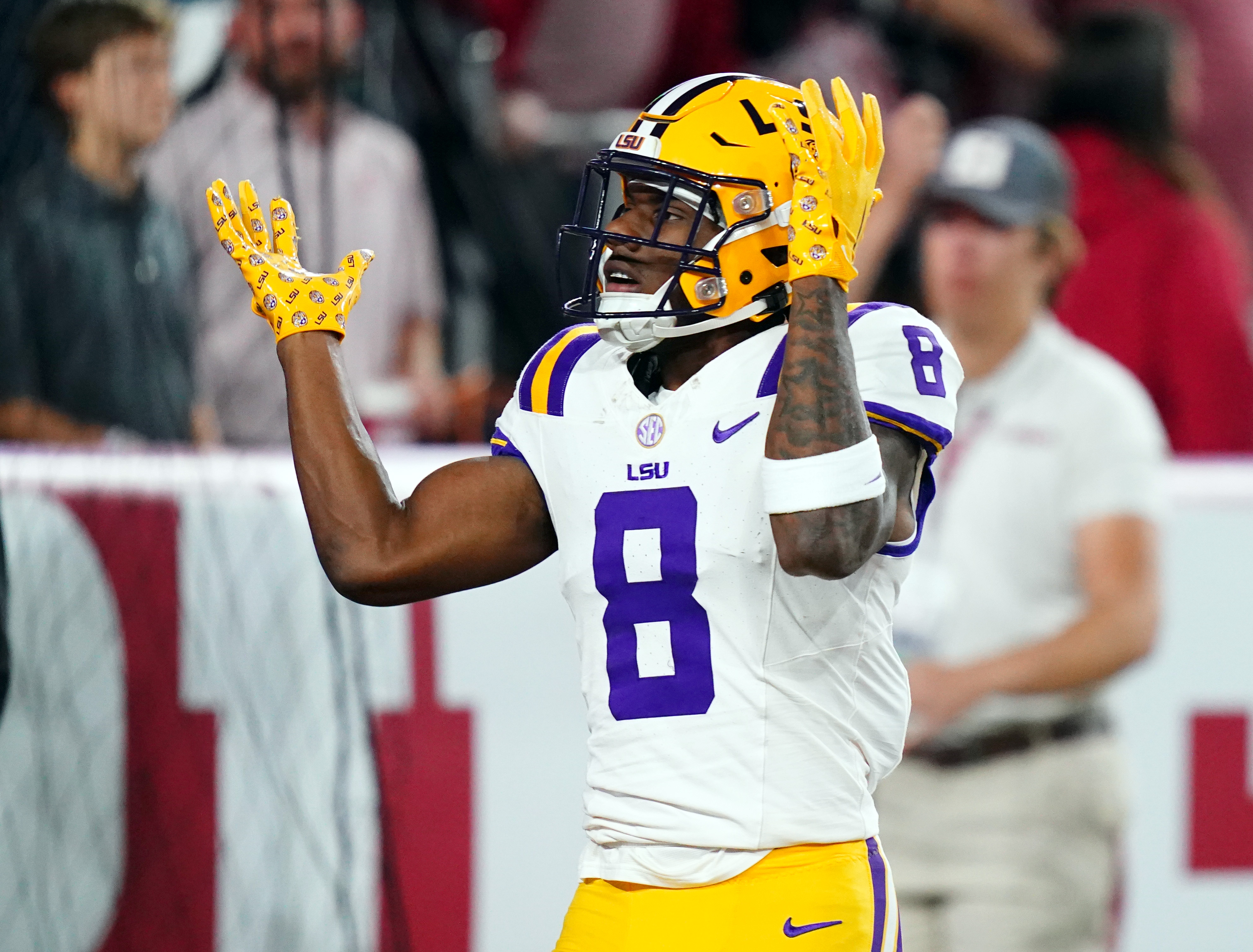 Nov 4, 2023; Tuscaloosa, Alabama, USA; LSU Tigers wide receiver Malik Nabers (New York Giants) (8) celebrates his 46 yard touchdown against the Alabama Crimson Tide during the first quarter at Bryant-Denny Stadium. Mandatory Credit: John David Mercer-USA TODAY Sports