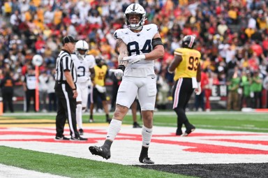 Nov 4, 2023; College Park, Maryland, USA;  Penn State Nittany Lions tight end Theo Johnson (New York Giants) (84) reacts after catching a shovel pass for a touchdown during the first half against the Maryland Terrapins at SECU Stadium. Mandatory Credit: Tommy Gilligan-USA TODAY Sports