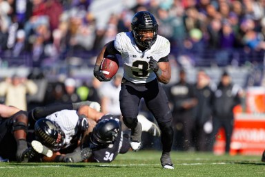 Nov 18, 2023; Evanston, Illinois, USA;  Purdue Boilermakers running back Tyrone Tracy Jr. (New York Giants) (3) runs with the ball against the Northwestern Wildcats at Ryan Field. Mandatory Credit: Jamie Sabau-USA TODAY Sports