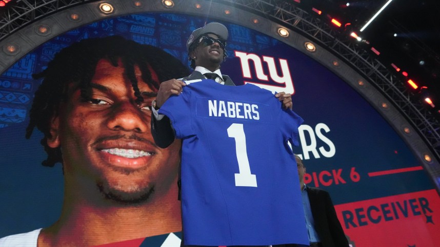 Tigers wide receiver Malik Nabers poses after being selected by the New York Giants as the No. 6 pick in the first round of the 2024 NFL Draft at Campus Martius Park and Hart Plaza. Mandatory Credit: Kirby Lee-USA TODAY Sports