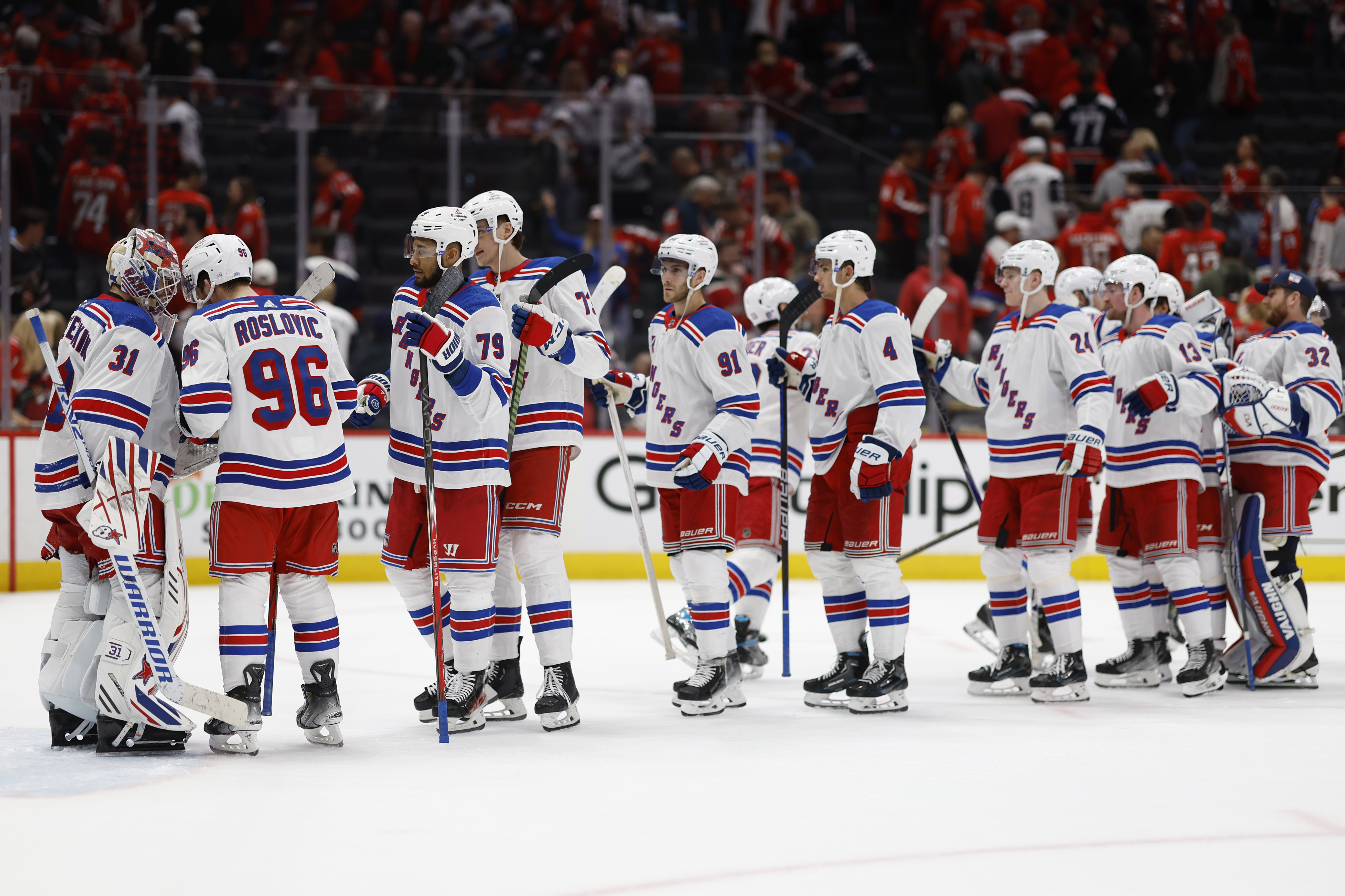 Apr 26, 2024; Washington, District of Columbia, USA; New York Rangers goaltender Igor Shesterkin (31) celebrates with teammates after their game against the Washington Capitals in game three of the first round of the 2024 Stanley Cup Playoffs at Capital One Arena. Mandatory Credit: Geoff Burke-USA TODAY Sports