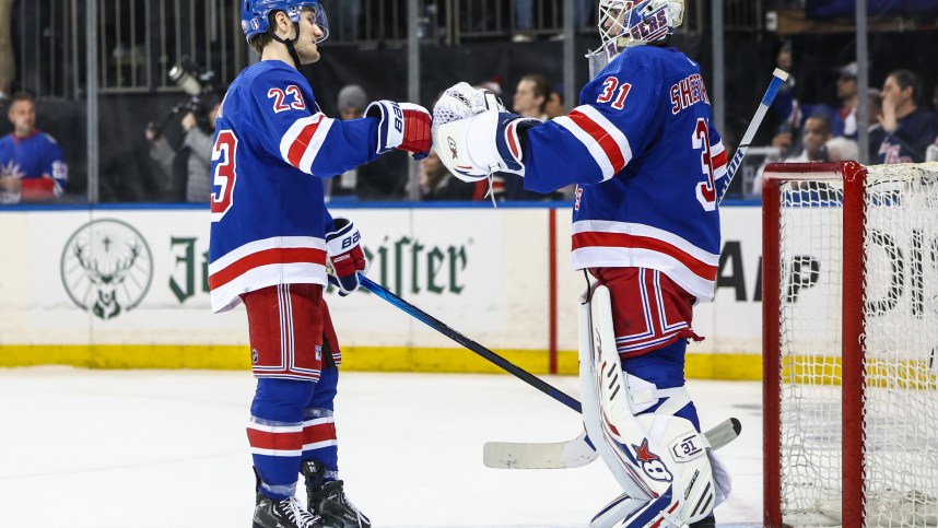 Apr 21, 2024; New York, New York, USA; New York Rangers defenseman Adam Fox (23) and goaltender Igor Shesterkin (31) congratulate each other after defeating the Washington Capitals 4-1 in game one of the first round of the 2024 Stanley Cup Playoffs at Madison Square Garden. Mandatory Credit: Wendell Cruz-USA TODAY Sports