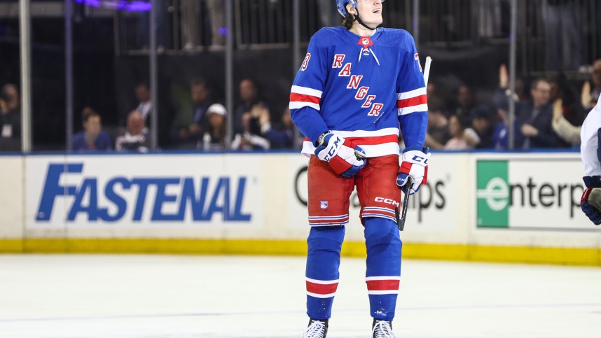 New York Rangers center Matt Rempe (73) looks at the scoreboard after scoring a goal in the second period against the Washington Capitals in game one of the first round of the 2024 Stanley Cup Playoffs at Madison Square Garden