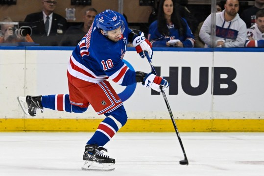 Apr 23, 2024; New York, New York, USA;  New York Rangers left wing Artemi Panarin (10) attempts a shot Washington Capitals during the third period in game two of the first round of the 2024 Stanley Cup Playoffs at Madison Square Garden. Mandatory Credit: Dennis Schneidler-USA TODAY Sports