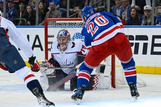 Apr 23, 2024; New York, New York, USA;  Washington Capitals goaltender Charlie Lindgren (79) makes a save on New York Rangers left wing Chris Kreider (20) during the third period in game two of the first round of the 2024 Stanley Cup Playoffs at Madison Square Garden. Mandatory Credit: Dennis Schneidler-USA TODAY Sports