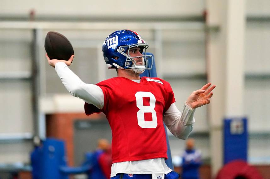 New York Giants quarterback Daniel Jones (8) throws during practice in East Rutherford on Wednesday, Jan. 11, 2023.