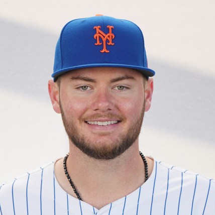 Feb 22, 2024; Port St. Lucie, FL, USA;  New York Mets pitcher Christian Scott (96) poses for a photo during media day. Mandatory Credit: Jim Rassol-USA TODAY Sports