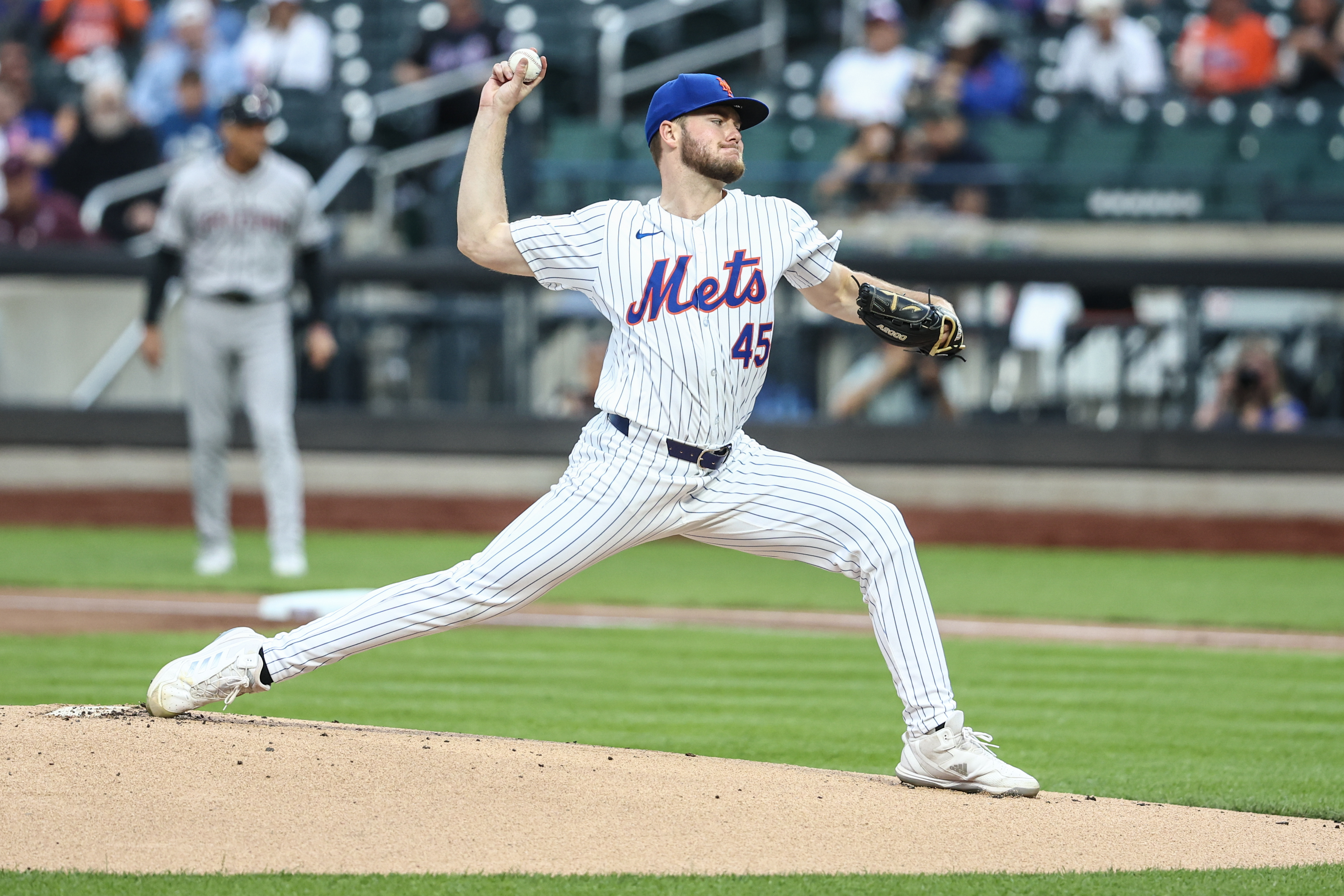 May 30, 2024; New York City, New York, USA; New York Mets starting pitcher Christian Scott (45) pitches in the first inning against the Arizona Diamondbacks at Citi Field. Mandatory Credit: Wendell Cruz-USA TODAY Sports