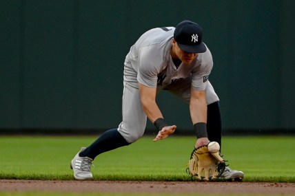 May 1, 2024; Baltimore, Maryland, USA; New York Yankees shortstop Anthony Volpe (11) fields a ground ball during the first inning against the Baltimore Orioles  at Oriole Park at Camden Yards. Mandatory Credit: Tommy Gilligan-USA TODAY Sports