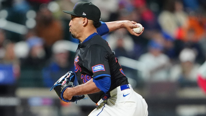 May 13, 2024; New York City, New York, USA; New York Mets pitcher Edwin Diaz (39) delivers a pitch against the Philadelphia Phillies during the ninth inning at Citi Field. Mandatory Credit: Gregory Fisher-USA TODAY Sports