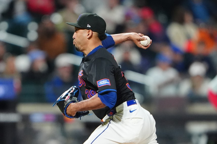 May 13, 2024; New York City, New York, USA; New York Mets pitcher Edwin Diaz (39) delivers a pitch against the Philadelphia Phillies during the ninth inning at Citi Field. Mandatory Credit: Gregory Fisher-USA TODAY Sports