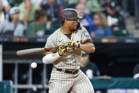 Sep 29, 2023; Chicago, Illinois, USA; San Diego Padres shortstop Xander Bogaerts (2) is hit by a pitch from Chicago White Sox relief pitcher Yohan Ramirez during the sixth inning at Guaranteed Rate Field. Mandatory Credit: Kamil Krzaczynski-USA TODAY Sports