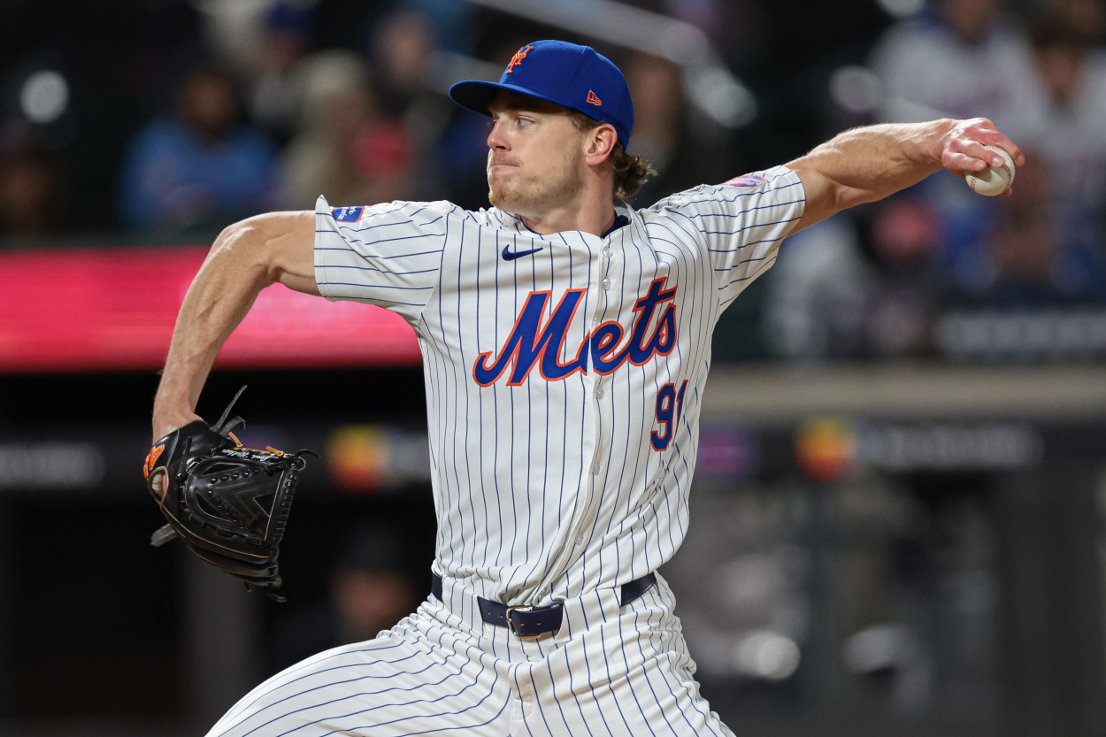 Apr 26, 2024; New York City, New York, USA; New York Mets relief pitcher Josh Walker (91) delivers a pitch in the sixth inning against the St. Louis Cardinals at Citi Field. Mandatory Credit: Vincent Carchietta-USA TODAY Sports