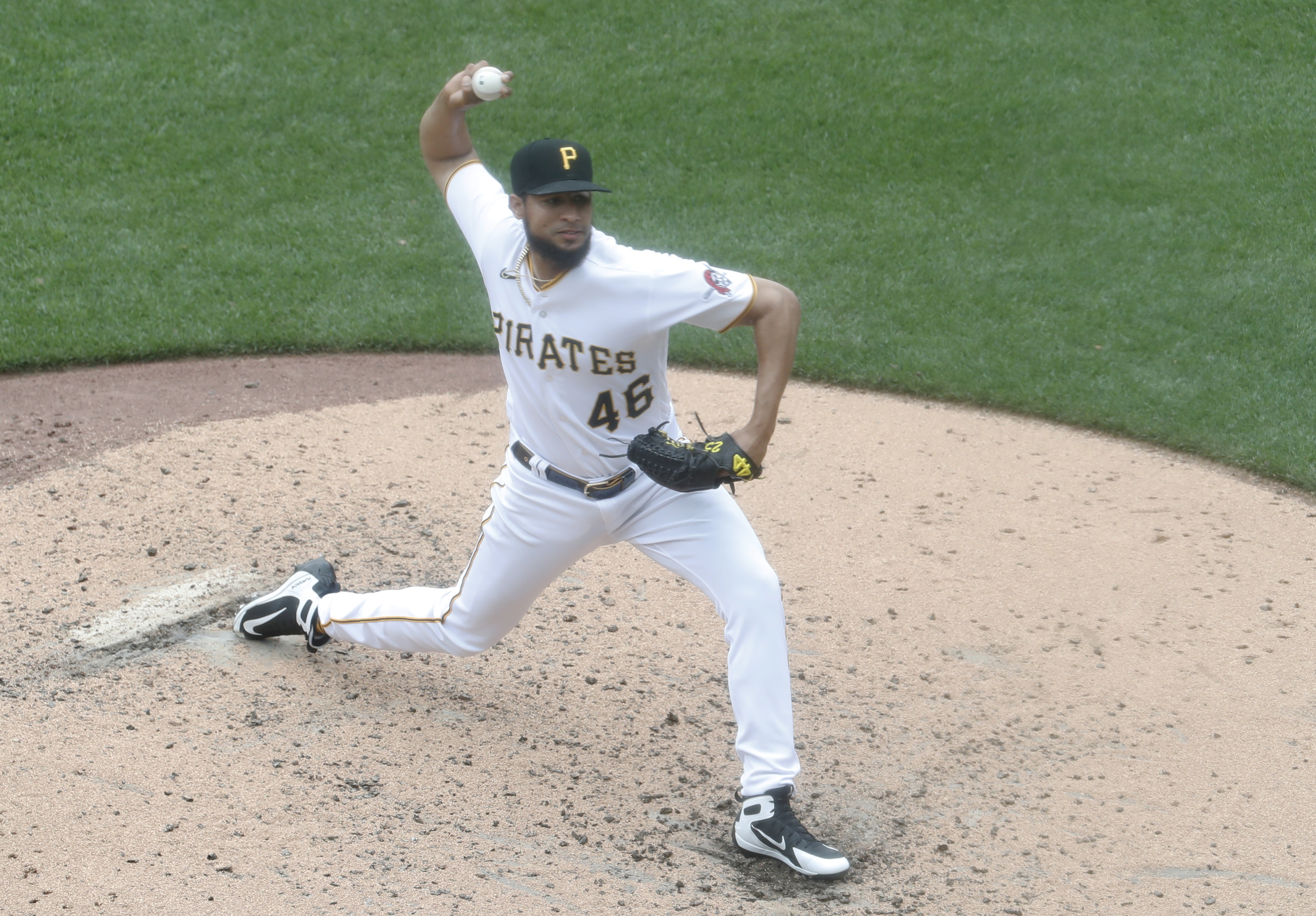 Aug 23, 2023; Pittsburgh, Pennsylvania, USA;  Pittsburgh Pirates relief pitcher Yohan Ramirez (New York Mets) (46) pitches against the St. Louis Cardinals during the fourth inning at PNC Park. Mandatory Credit: Charles LeClaire-USA TODAY Sports