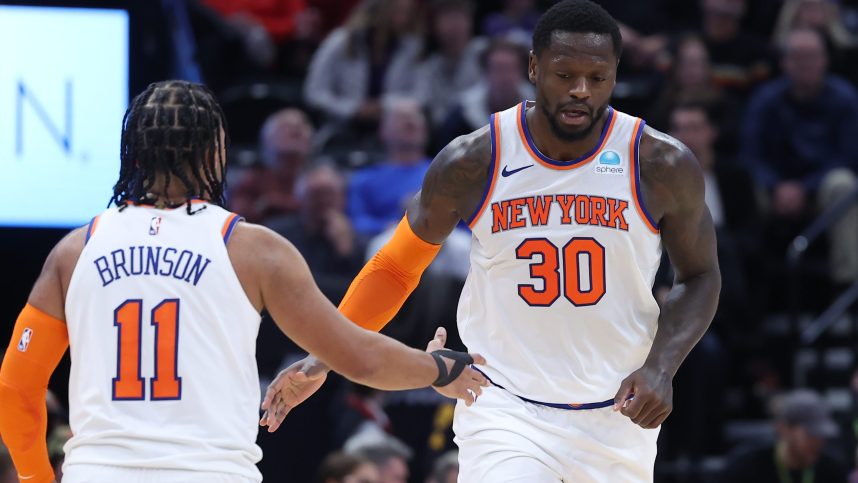 New York Knicks forward Julius Randle (30) and guard Jalen Brunson (11) react to a play against the Utah Jazz during the third quarter at Delta Center