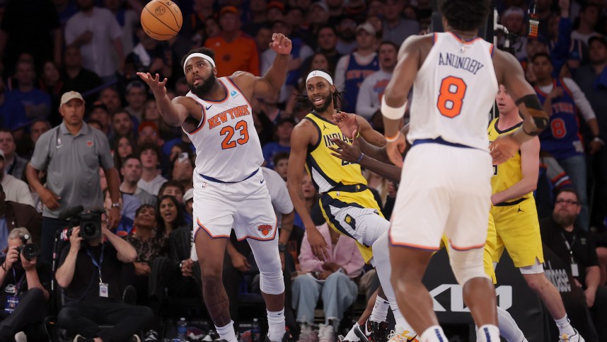 May 6, 2024; New York, New York, USA; New York Knicks center Mitchell Robinson (23) grabs a rebound against Indiana Pacers forward Isaiah Jackson (22) during the fourth quarter of game one of the second round of the 2024 NBA playoffs at Madison Square Garden. Mandatory Credit: Brad Penner-USA TODAY Sports