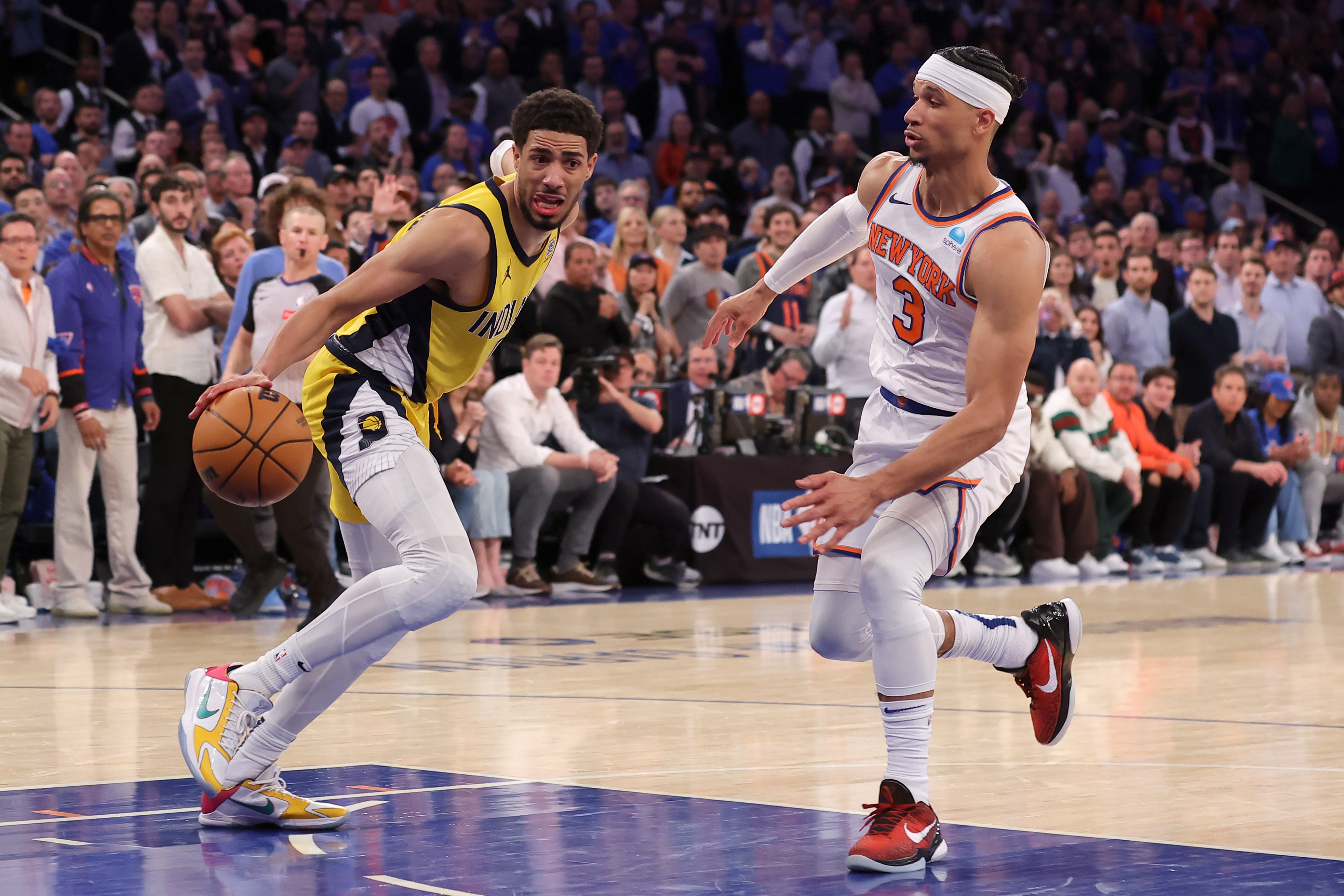 May 6, 2024; New York, New York, USA; Indiana Pacers guard Tyrese Haliburton (0) controls the ball against New York Knicks guard Josh Hart (3) during the fourth quarter of game one of the second round of the 2024 NBA playoffs at Madison Square Garden. Mandatory Credit: Brad Penner-USA TODAY Sports