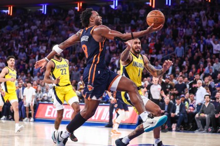 May 8, 2024; New York, New York, USA; New York Knicks forward OG Anunoby (8) drives past Indiana Pacers forward Obi Toppin (1) in the third quarter during game two of the second round for the 2024 NBA playoffs at Madison Square Garden. Mandatory Credit: Wendell Cruz-USA TODAY Sports