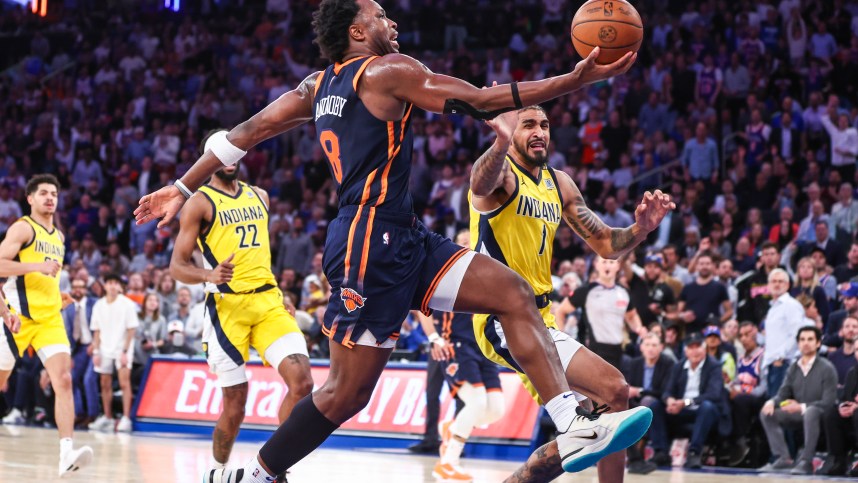 May 8, 2024; New York, New York, USA; New York Knicks forward OG Anunoby (8) drives past Indiana Pacers forward Obi Toppin (1) in the third quarter during game two of the second round for the 2024 NBA playoffs at Madison Square Garden. Mandatory Credit: Wendell Cruz-USA TODAY Sports