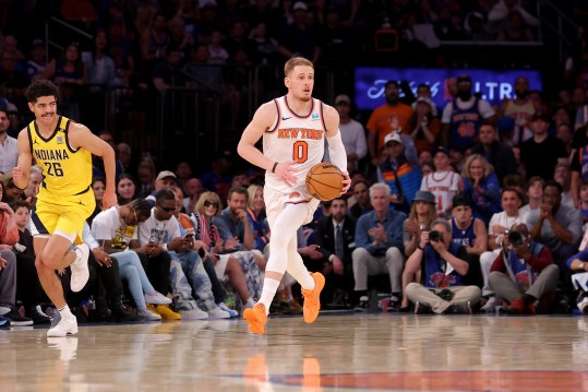 May 19, 2024; New York, New York, USA; New York Knicks guard Donte DiVincenzo (0) brings the ball up court against Indiana Pacers guard Ben Sheppard (26) during the fourth quarter of game seven of the second round of the 2024 NBA playoffs at Madison Square Garden. Mandatory Credit: Brad Penner-USA TODAY Sports