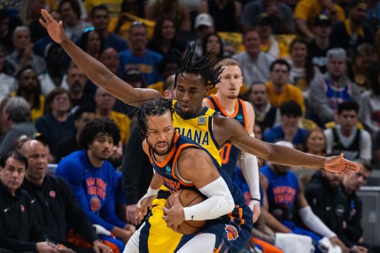 May 12, 2024; Indianapolis, Indiana, USA;  New York Knicks guard Jalen Brunson (11) holds the ball while Indiana Pacers forward Aaron Nesmith (23) defends during game four of the second round for the 2024 NBA playoffs at Gainbridge Fieldhouse. Mandatory Credit: Trevor Ruszkowski-USA TODAY Sports