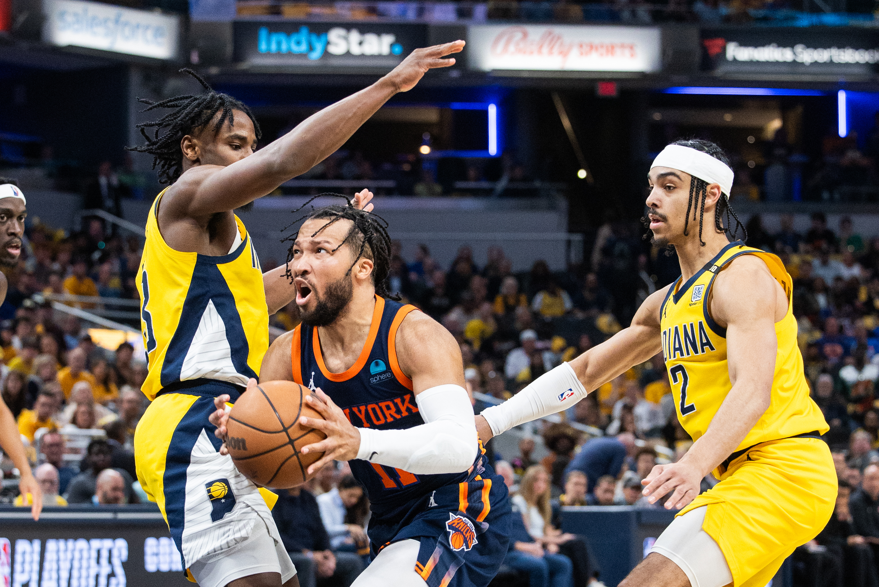 May 12, 2024; Indianapolis, Indiana, USA; New York Knicks guard Jalen Brunson (11) shoots the ball while  Indiana Pacers forward Aaron Nesmith (23) defends during game four of the second round for the 2024 NBA playoffs at Gainbridge Fieldhouse. Mandatory Credit: Trevor Ruszkowski-USA TODAY Sports