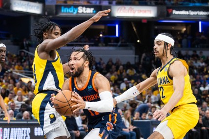 May 12, 2024; Indianapolis, Indiana, USA; New York Knicks guard Jalen Brunson (11) shoots the ball while  Indiana Pacers forward Aaron Nesmith (23) defends during game four of the second round for the 2024 NBA playoffs at Gainbridge Fieldhouse. Mandatory Credit: Trevor Ruszkowski-USA TODAY Sports