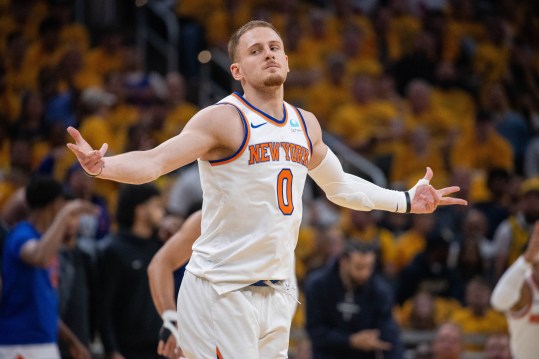 May 17, 2024; Indianapolis, Indiana, USA; New York Knicks guard Donte DiVincenzo (0) reacts after a made basket during game six of the second round for the 2024 NBA playoffs against the Indiana Pacers at Gainbridge Fieldhouse. Mandatory Credit: Trevor Ruszkowski-USA TODAY Sports