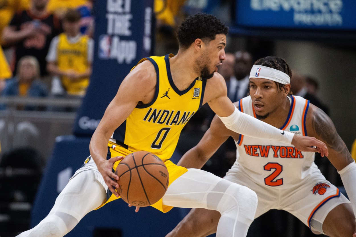 May 17, 2024; Indianapolis, Indiana, USA; Indiana Pacers guard Tyrese Haliburton (0) dribbles the ball while New York Knicks guard Miles McBride (2) defends during game six of the second round for the 2024 NBA playoffs at Gainbridge Fieldhouse. Mandatory Credit: Trevor Ruszkowski-USA TODAY Sports