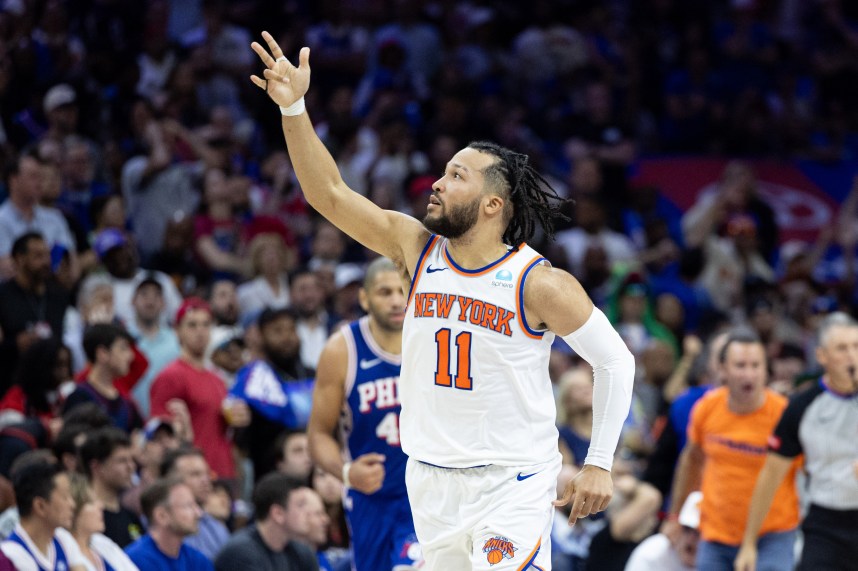May 2, 2024; Philadelphia, Pennsylvania, USA; New York Knicks guard Jalen Brunson (11) reacts after his three pointer against the Philadelphia 76ers during the second half of game six of the first round for the 2024 NBA playoffs at Wells Fargo Center. Mandatory Credit: Bill Streicher-USA TODAY Sports