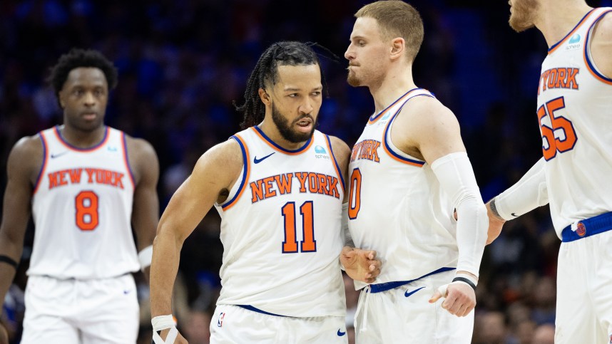 May 2, 2024; Philadelphia, Pennsylvania, USA; New York Knicks guard Jalen Brunson (11) reacts with guard Donte DiVincenzo (0) after scoring against the Philadelphia 76ers during the second half of game six of the first round for the 2024 NBA playoffs at Wells Fargo Center. Mandatory Credit: Bill Streicher-USA TODAY Sports