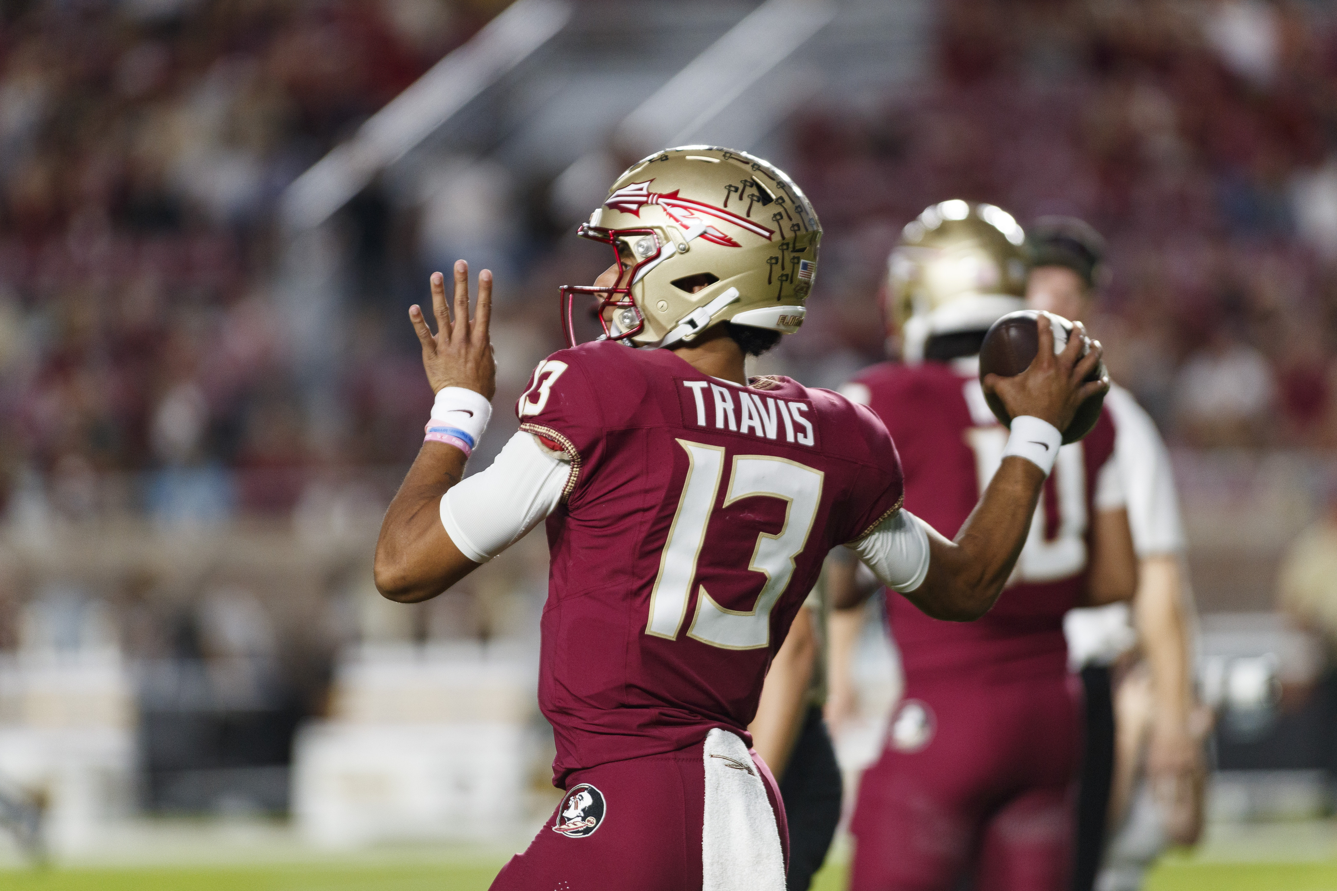 Nov 18, 2023; Tallahassee, Florida, USA; Florida State Seminoles quarterback Jordan Travis (New York Jets) (13) throws a pass during the warm ups against the North Alabama Lions at Doak S. Campbell Stadium. Mandatory Credit: Morgan Tencza-USA TODAY Sports