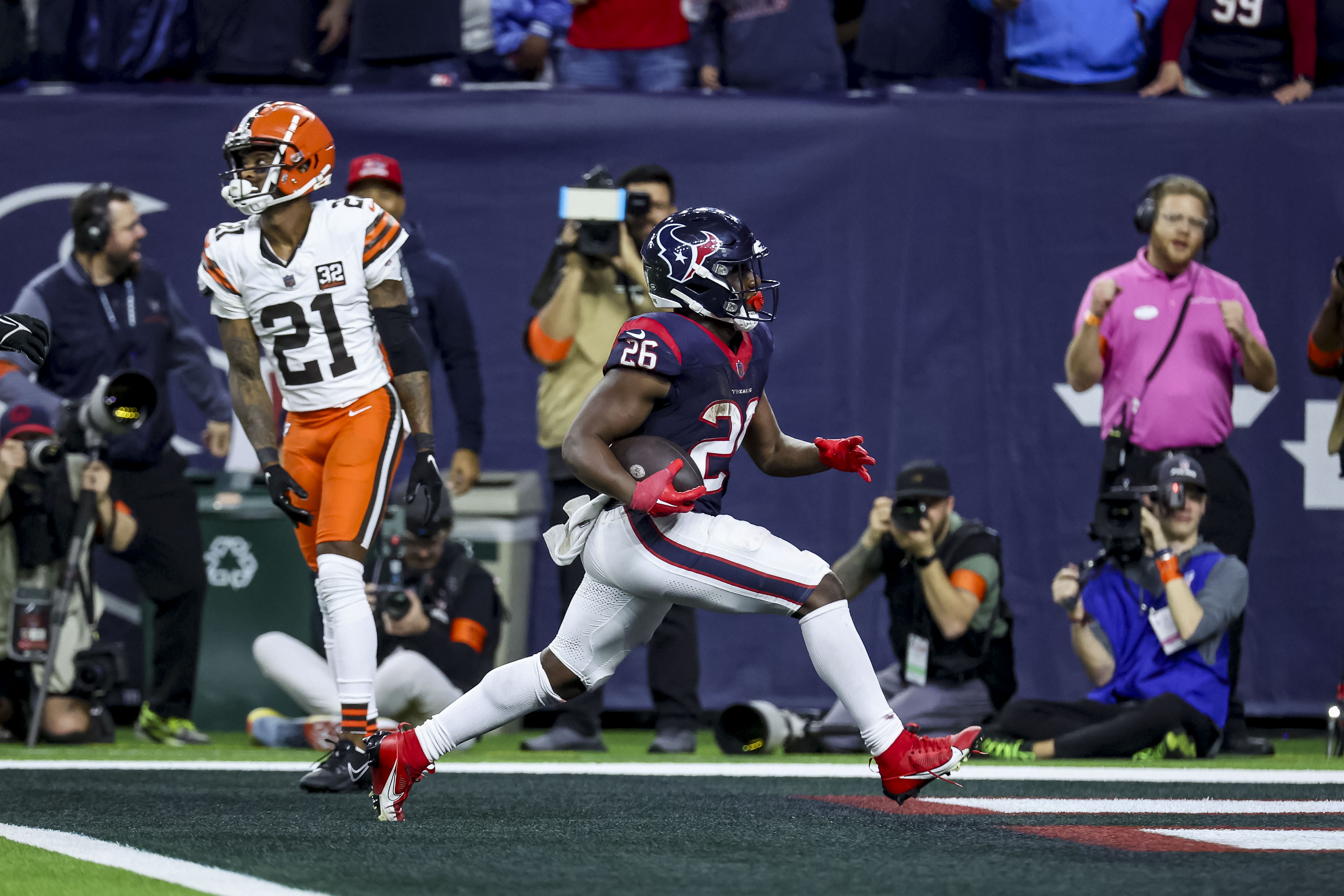 Jan 13, 2024; Houston, Texas, USA; Houston Texans running back Devin Singletary (New York Giants)(26) scores a touchdown during the fourth quarter in a 2024 AFC wild card game at NRG Stadium. Mandatory Credit: Troy Taormina-USA TODAY Sports