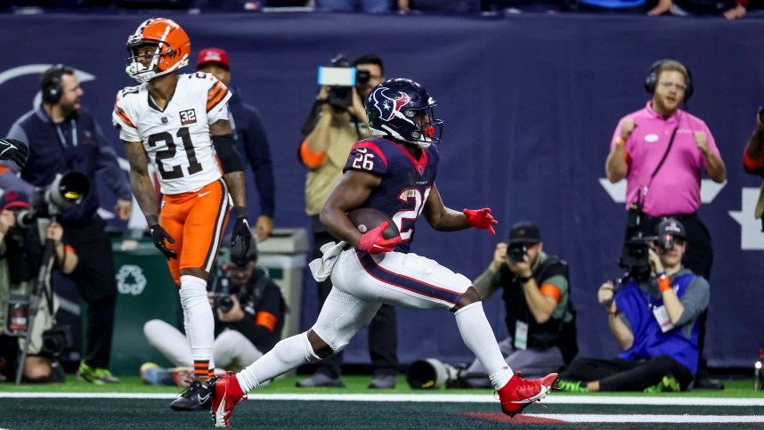 Jan 13, 2024; Houston, Texas, USA; Houston Texans running back Devin Singletary (New York Giants)(26) scores a touchdown during the fourth quarter in a 2024 AFC wild card game at NRG Stadium. Mandatory Credit: Troy Taormina-USA TODAY Sports
