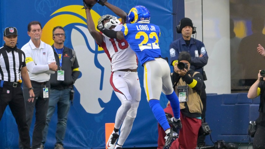 Nov 13, 2022; Inglewood, California, USA;  Arizona Cardinals wide receiver A.J. Green (18) catches the ball in front of Los Angeles Rams cornerback David Long Jr. (New York Giants) (22) for a touchdown in the first half at SoFi Stadium. Mandatory Credit: Jayne Kamin-Oncea-USA TODAY Sports