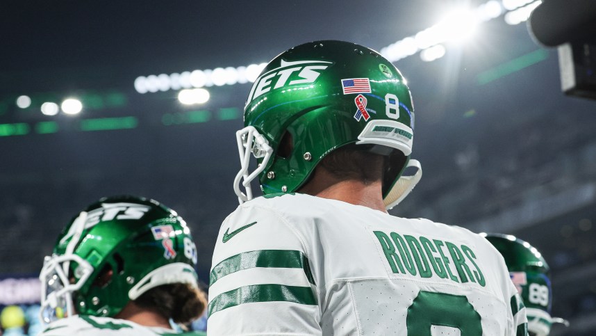 Sep 11, 2023; East Rutherford, New Jersey, USA; New York Jets quarterback Aaron Rodgers (8) walks on the field at MetLife Stadium before the game against the Buffalo Bills. Mandatory Credit: Vincent Carchietta-USA TODAY Sports