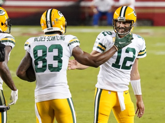 Nov 5, 2020; Santa Clara, California, USA; Green Bay Packers wide receiver Marquez Valdes-Scantling (83) celebrates with quarterback Aaron Rodgers (12) after catching a pass to score a touchdown against the San Francisco 49ers during the second quarter at Levi's Stadium. Mandatory Credit: Kyle Terada-USA TODAY Sports