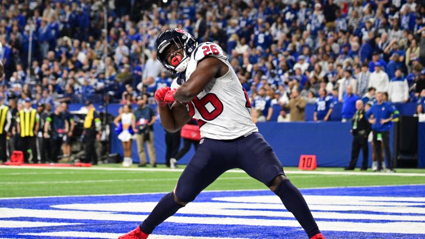 Jan 6, 2024; Indianapolis, Indiana, USA; Houston Texans running back Devin Singletary (26) celebrates after a touchdown against the Indianapolis Colts during the second half at Lucas Oil Stadium. Mandatory Credit: Marc Lebryk-USA TODAY Sports, new york giants