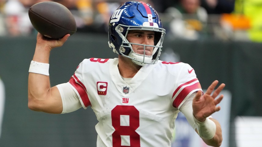 Oct 9, 2022; London, United Kingdom; New York Giants quarterback Daniel Jones (8) throws the ball in the second half against the Green Bay Packers during an NFL International Series game at Tottenham Hotspur Stadium. Mandatory Credit: Kirby Lee-USA TODAY Sports