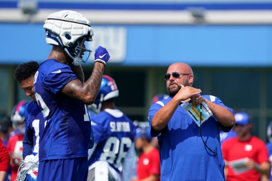 Jul 26, 2023; East Rutherford, NJ, USA; New York Giants head coach Brian Daboll, right, talks with tight end Darren Waller on the first day of training camp at the Quest Diagnostics Training Facility. Mandatory Credit: Danielle Parhizkaran-USA TODAY Sports