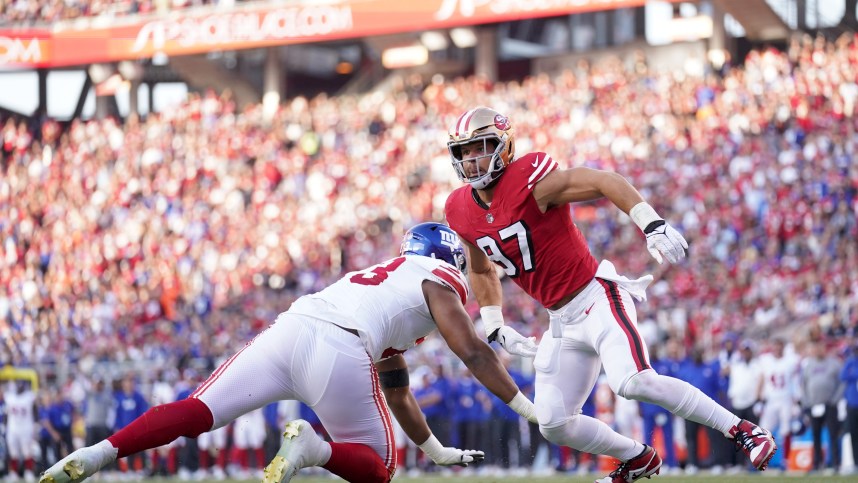 Sep 21, 2023; Santa Clara, California, USA; San Francisco 49ers defensive end Nick Bosa (97) attempts to run past New York Giants offensive tackle Evan Neal (73) in the second quarter at Levi's Stadium. Mandatory Credit: Cary Edmondson-USA TODAY Sports