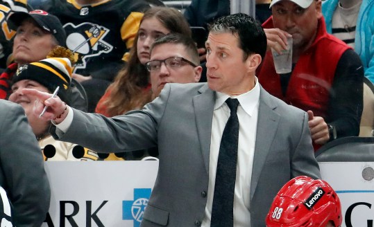 Mar 26, 2024; Pittsburgh, Pennsylvania, USA;  Carolina Hurricanes head coach Rod Brind'Amour gestures on the bench against the Pittsburgh Penguins during the third period at PPG Paints Arena. Pittsburgh won 4-1. Mandatory Credit: Charles LeClaire-USA TODAY Sports