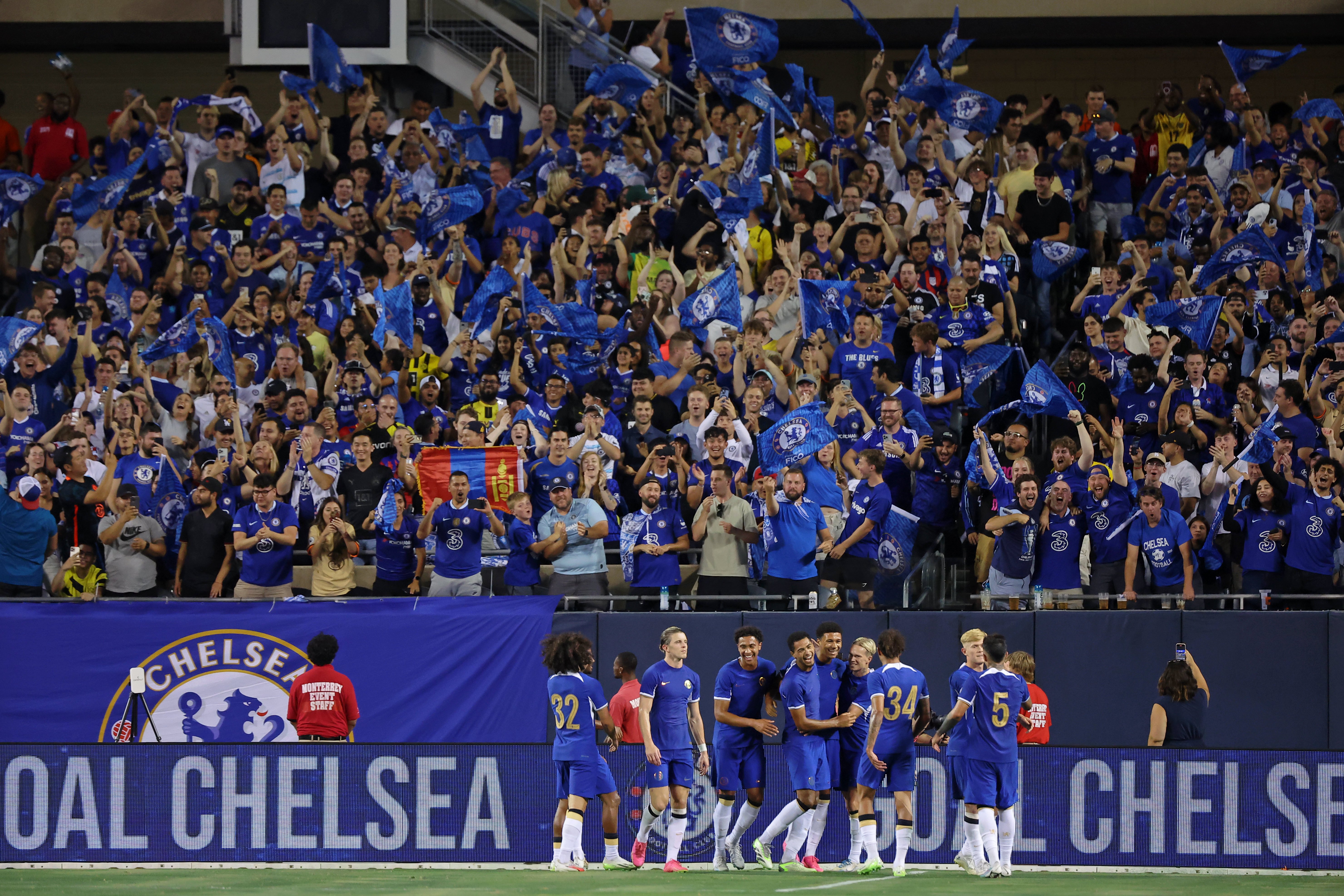 Aug 2, 2023; Chicago, Illinois, USA; Chelsea celebrate after forward Mason Burstow (48) scored a goal against Borussia Dortmund during the second half at Soldier Field. Mandatory Credit: Jon Durr-USA TODAY Sports